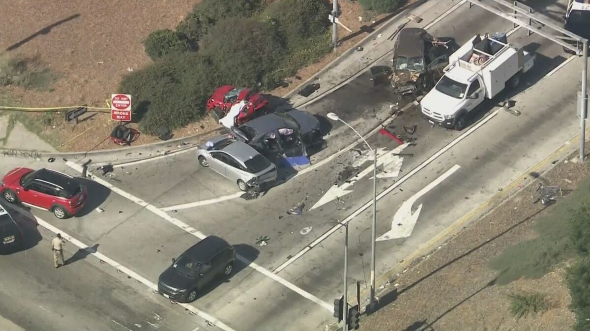 An aerial view shows the scene of a multi-vehicle traffic crash.