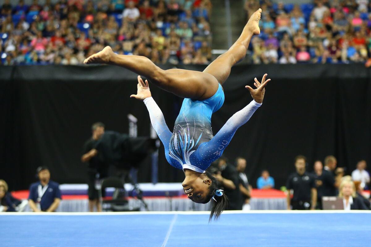 Simone Biles competes in the floor exercise during the 2016 P&G Gymnastics Championships in St. Louis.
