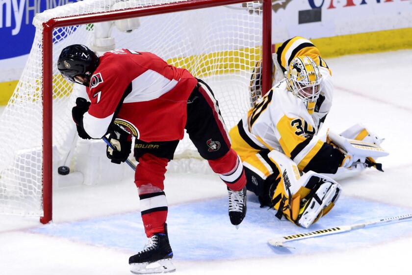 Ottawa Senators center Kyle Turris (7) scores against Pittsburgh Penguins goalie Matt Murray (30) during the second period of game three of the Eastern Conference final in the NHL Stanley Cup hockey playoffs in Ottawa on Wednesday, May 17, 2017. (Sean Kilpatrick/The Canadian Press via AP)