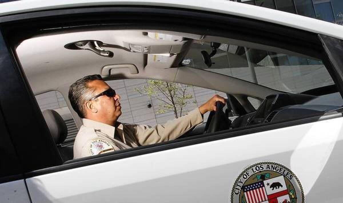 Parking enforcement officer Richard Garcia has patrolled the streets of L.A. for 27 years. He sometimes feels like he’s in a battle he can’t win: “There’s just no more space and there’s more and more vehicles.”