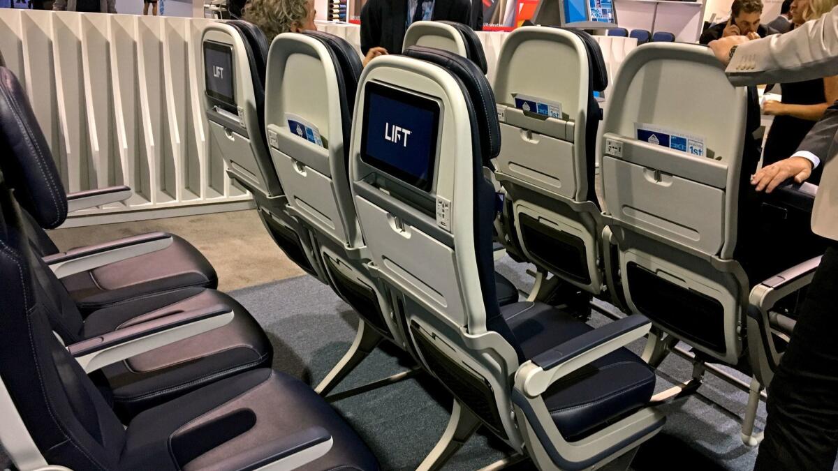 Airline-seat manufacturers display their new models at an expo in Long Beach in 2017.