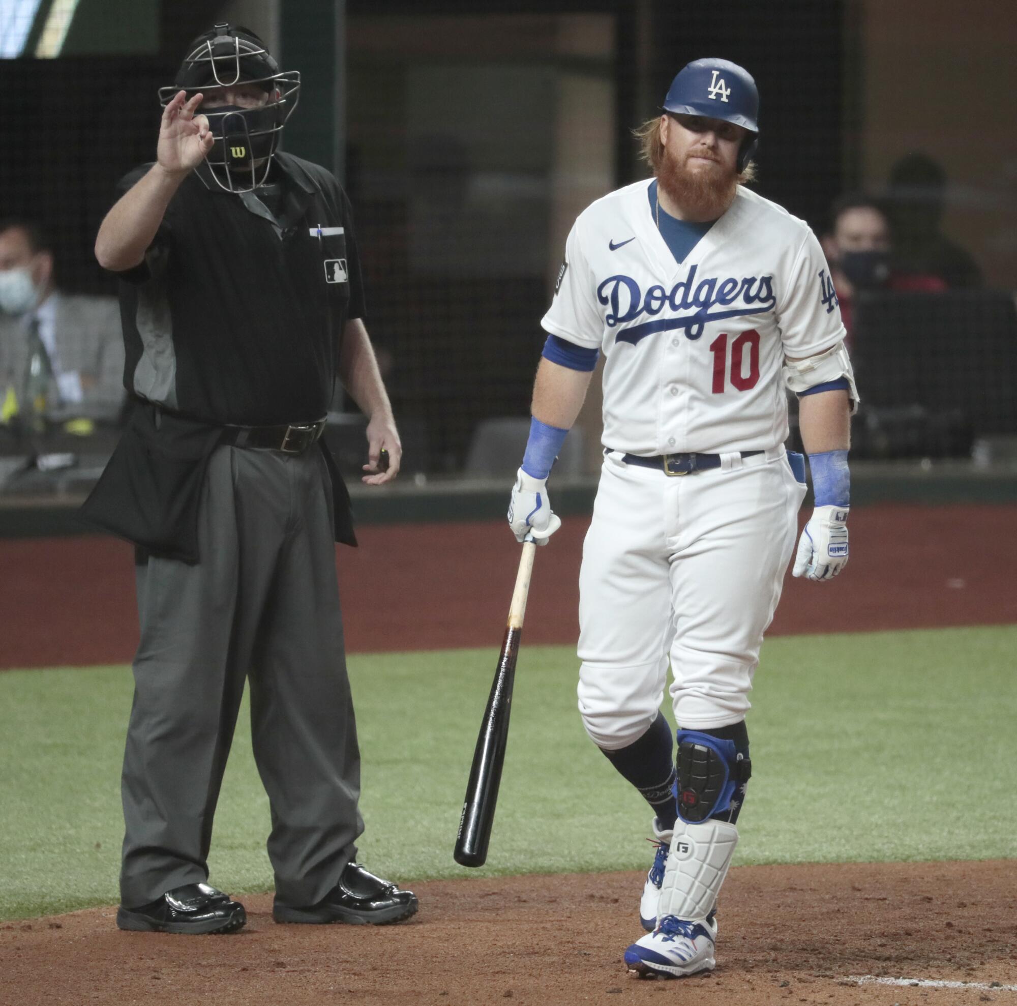 Dodgers third baseman Justin Turner reacts after striking out in the first inning.