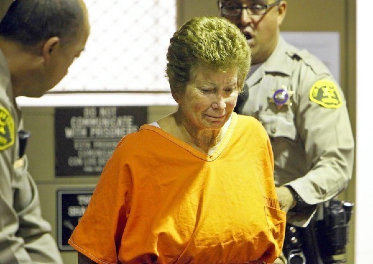 Lois Goodman, a tennis umpire accused of bludgeoning her husband to death at their Woodland Hills home earlier this year, appears at her arraignment in Van Nuys on Wednesday.