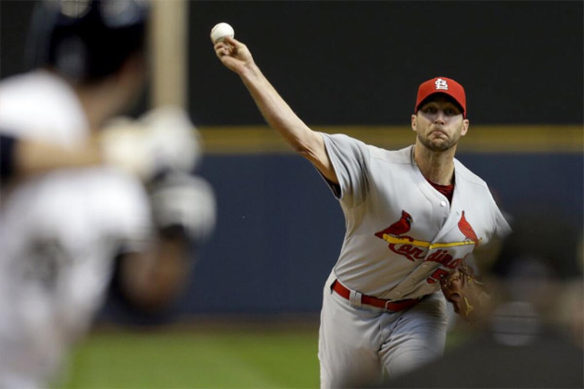 St. Louis Cardinals pitcher Adam Wainwright pitches against the Milwaukee Brewers.
