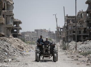 Years of warfare have devastated most streets in Yarmouk, Syria.