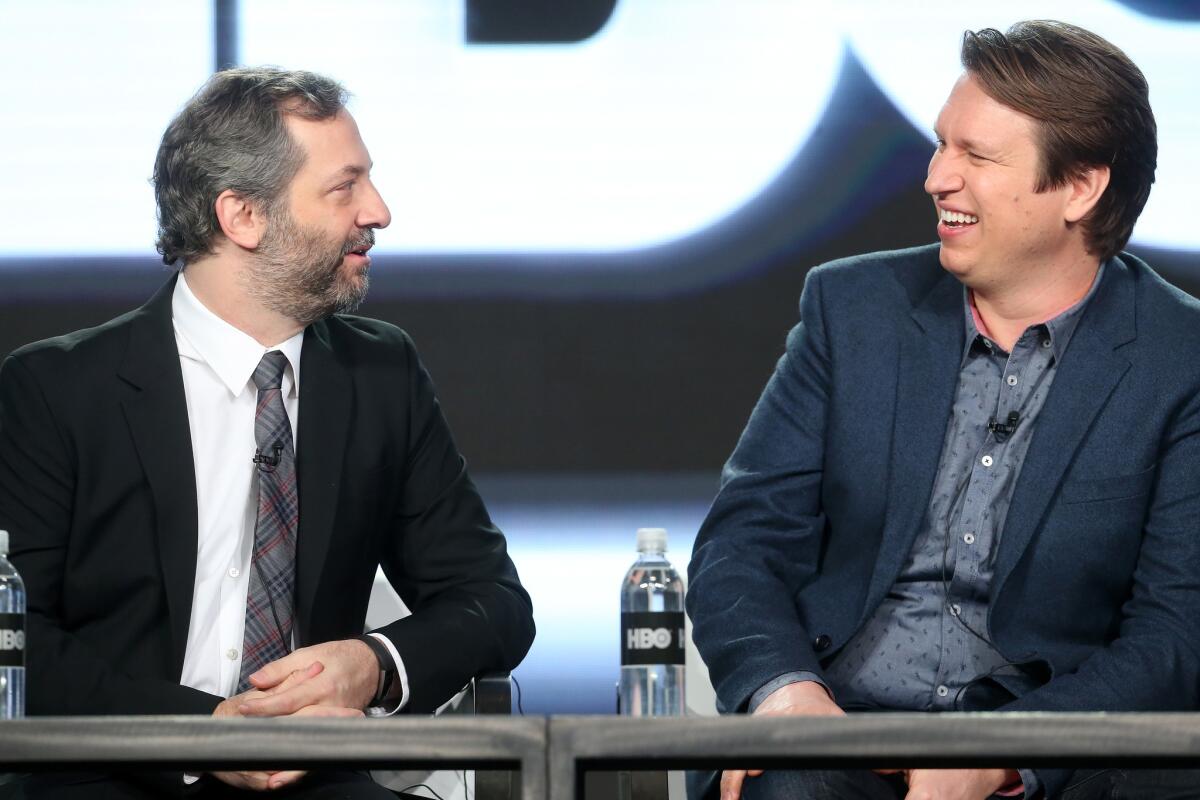 Judd Apatow, left, and Pete Holmes discuss their HBO series "Crashing" at the Langham Hotel in Pasadena on Saturday.