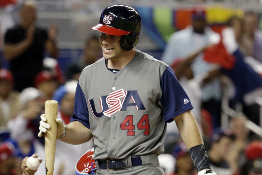 FILE - United States' Paul Goldschmidt (44) walks off after striking out during a first-round game of the World Baseball Classic against the Dominican Republic, on March 11, 2017, in Miami. Major League Baseball’s new pitch clock, limits on shifts and larger bases will not be used during the World Baseball Classic. The three innovations will be debuted during the spring training exhibition season that starts Feb. 24. The 20-team national team tournament runs from March 8-21, and players will return to their clubs for more exhibition games with the new rules ahead of opening day on March 30. (AP Photo/Lynne Sladky, File0