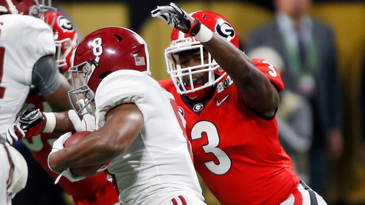 Georgia linebacker Roquan Smith, going for a tackle on Alabama's Josh Jacobs, would be a good fit in Oakland.