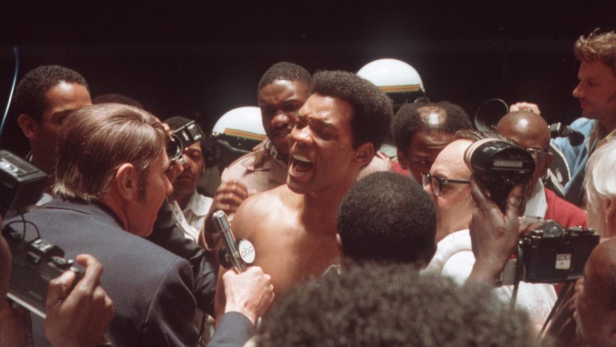 Will Smith, center, as Muhammad Ali in "Ali." (Howard Bingham / Columbia Pictures)