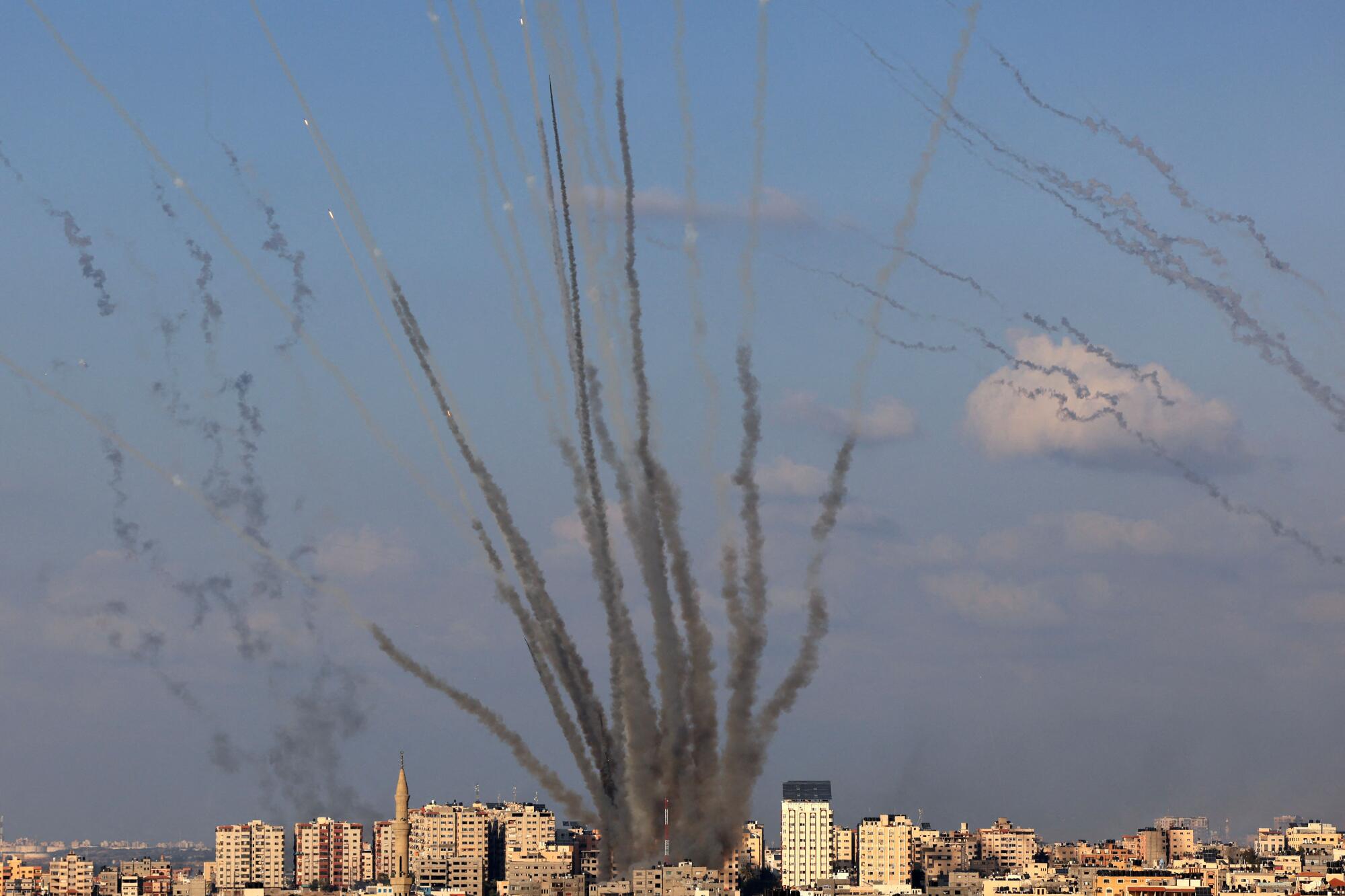 A salvo of rockets is fired by Palestinian militants from Gaza toward Israel.