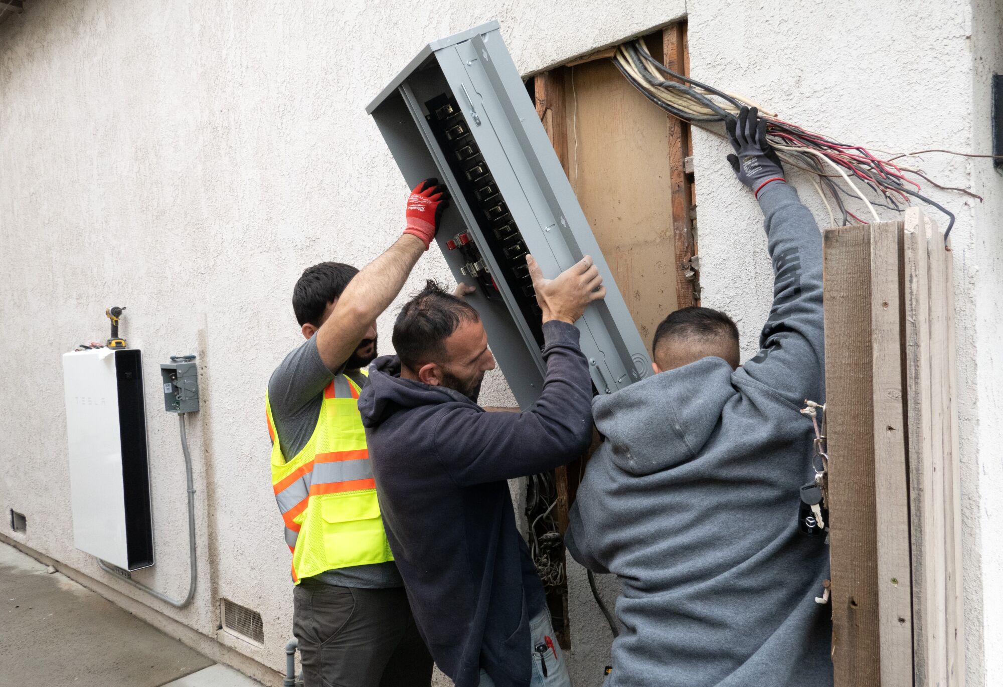 Solar panels: Should you buy them? Rent them? Pass? 2 Solar installers install a main service box upgraded to handle 200 amps.