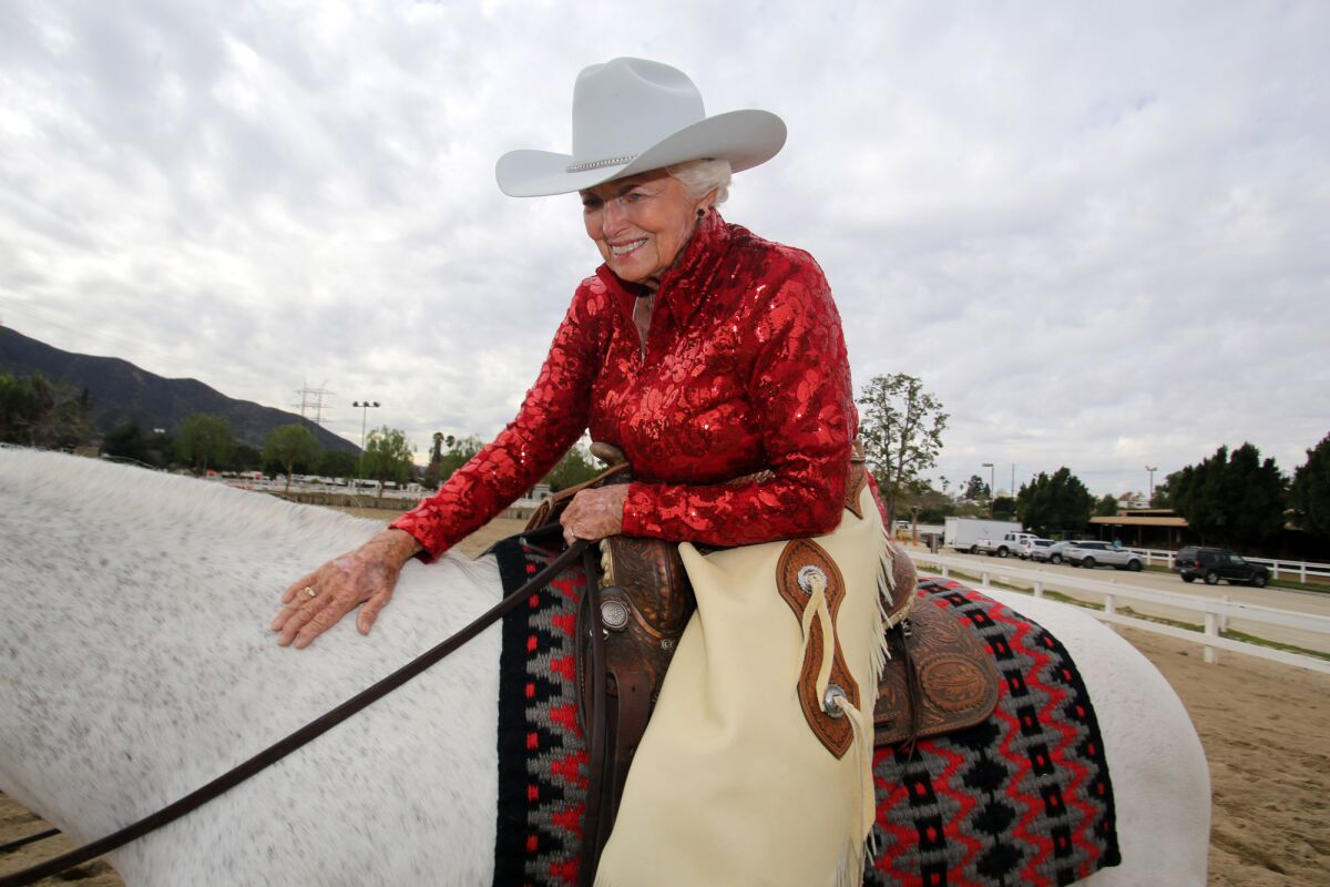 Pat North Ommert sits on "Huntin A Hottie" at the Los Angeles Equestrian Center in Burbank, on Wednesday, Dec. 18. Ommert will be riding in the 2020 Rose Parade with Horsewomen of Temecula Valley.