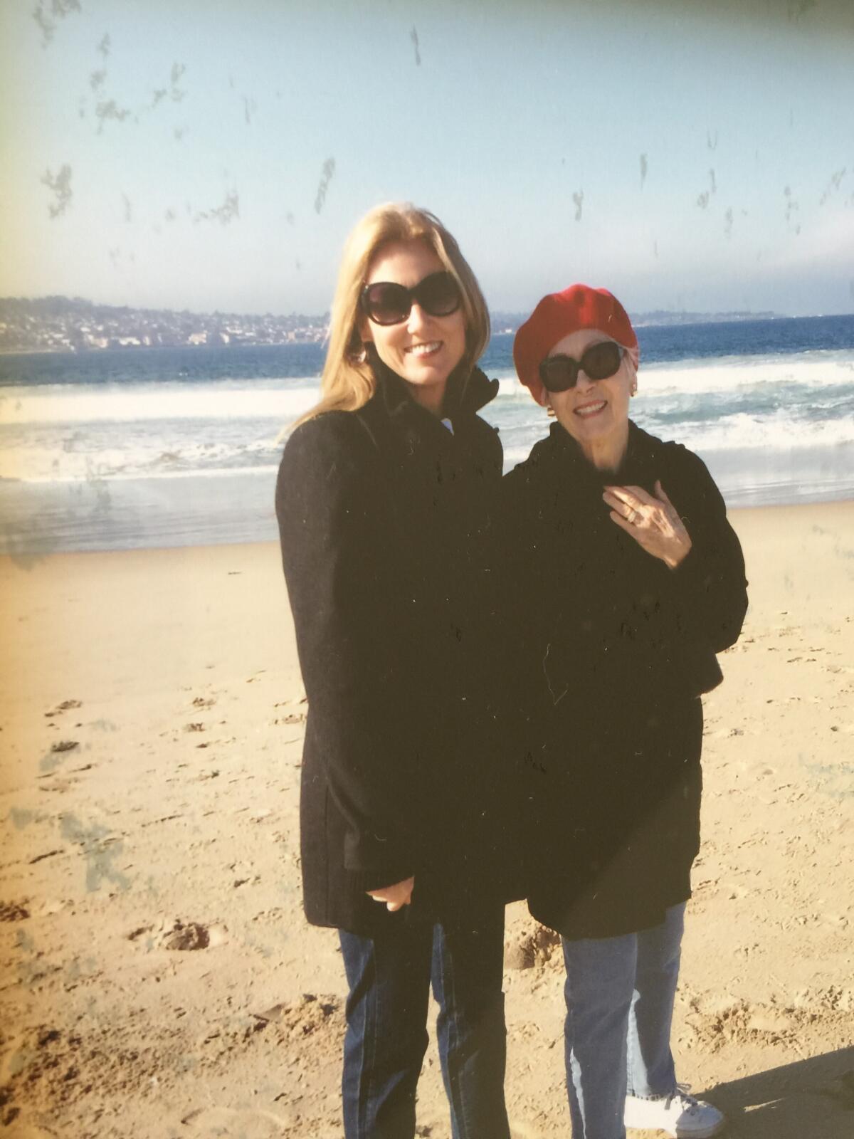 Jennifer Randall and her mom, Bonnie Randall, pose for a photo at the beach in 2012. 
