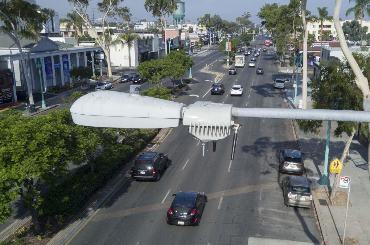  San Diego has installed thousands of "smart" streetlamps that include an array of sensors, including video and audio. On Friday August 2, 2019, these camera arrays, mounted on the "cobra head" style street lamps were photographed in North Park at the corner of Illinois and El Cajon Blvd.