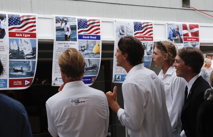 Governor's Cup returns despite COVID-19 challenges - Los Angeles Times 3 Racers view posters of the competitors at the Governor's Cup banquet on Monday evening at Balboa Yacht Club.