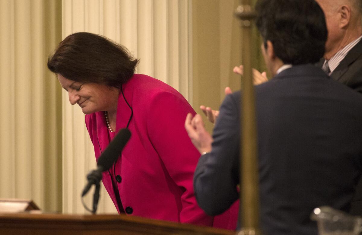 Assembly Speaker Toni Atkins takes a bow during a joint session of the California Legislature for Governor Brown's State of the State speech in Sacramento on Jan. 21.