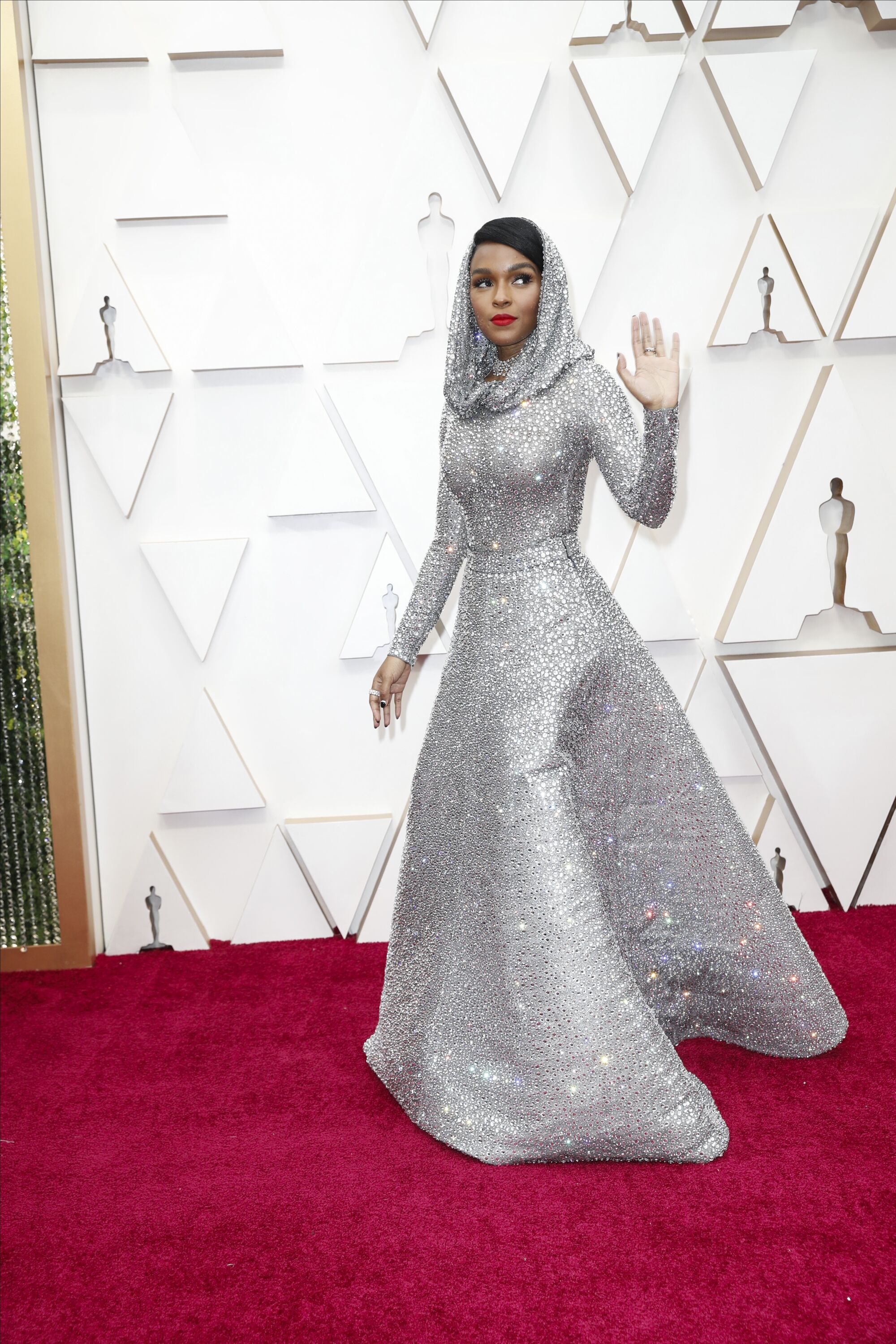 Janelle Monáe waves to the crowd as she arrives at the Academy Awards in   2020.