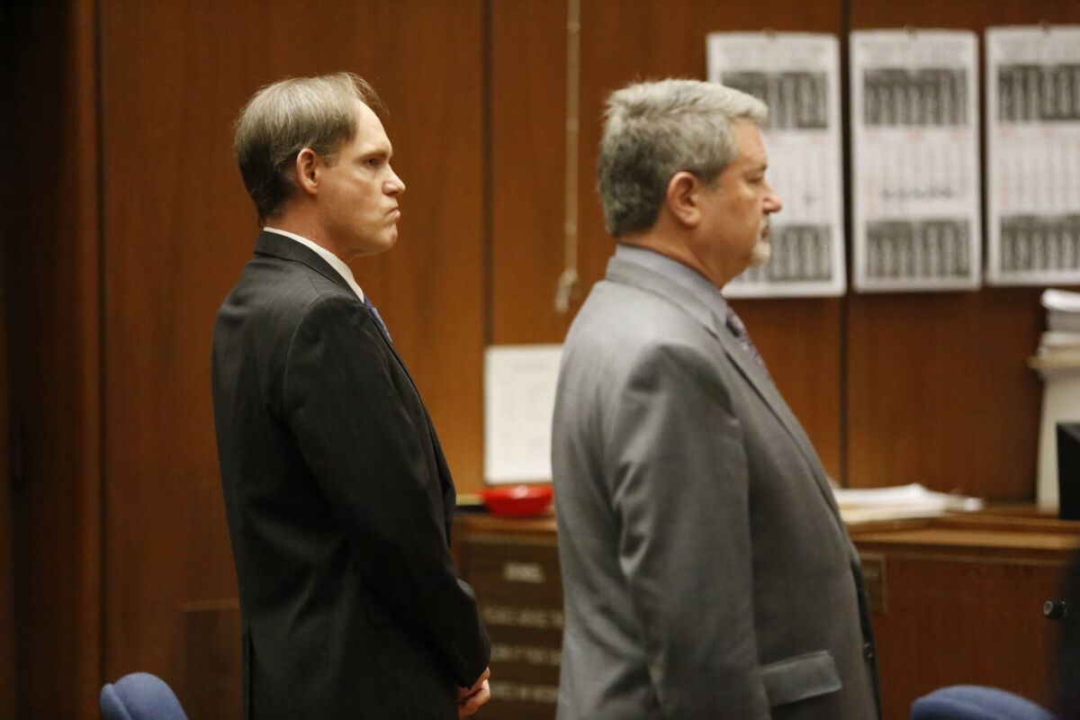 Cameron Brown, left, with his defense attorney Aron Laub, right, was found guilty of first degree murder for deliberately throwing his 4-year-old daughter from a Rancho Palos Verdes cliff to avoid paying child support.
