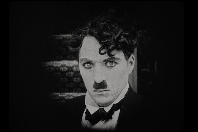 Chaplin in his 1916 film “One A.M.”
