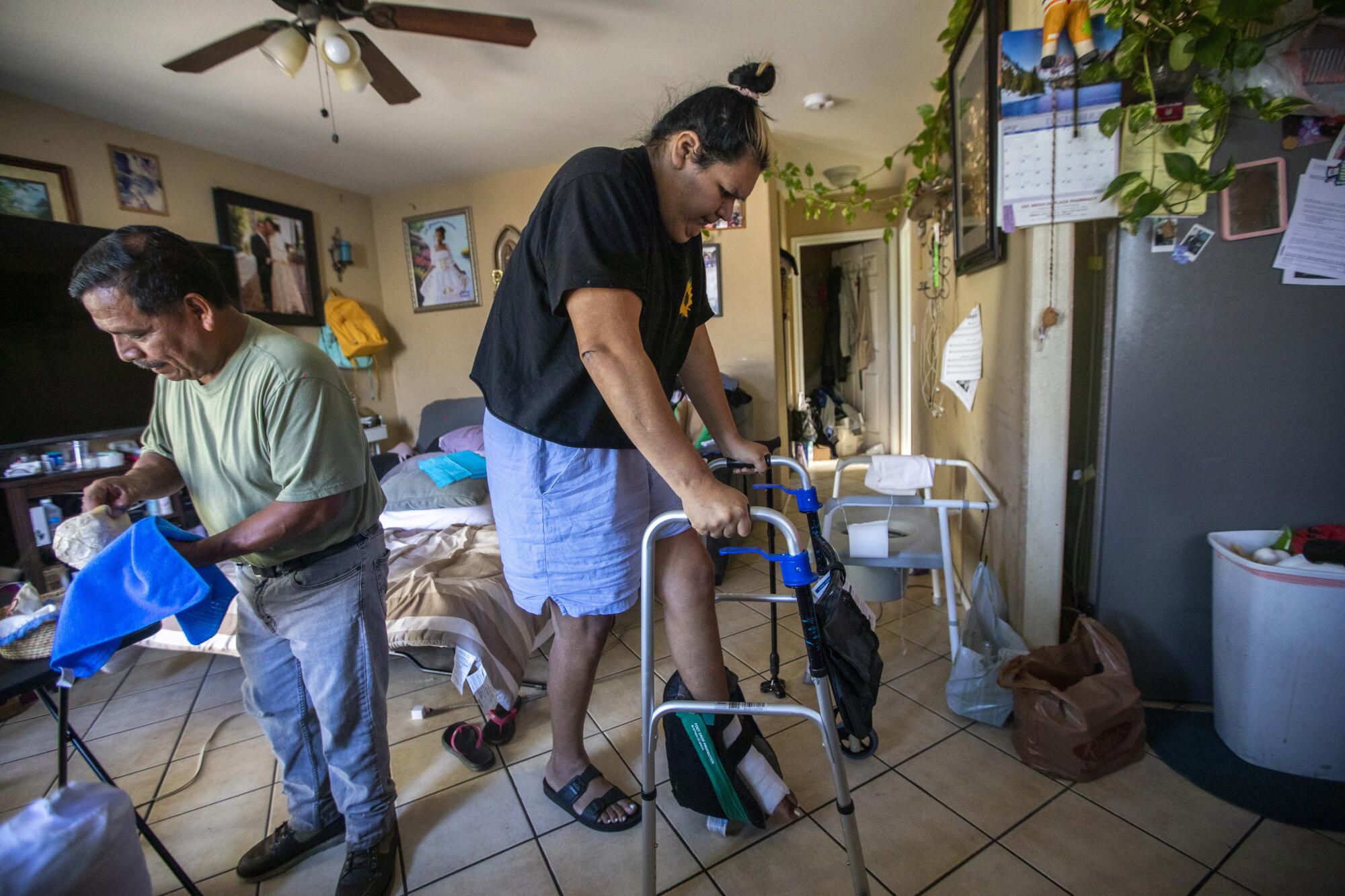 Jose Morales and Sandy Vazquez in their South Los Angeles home.