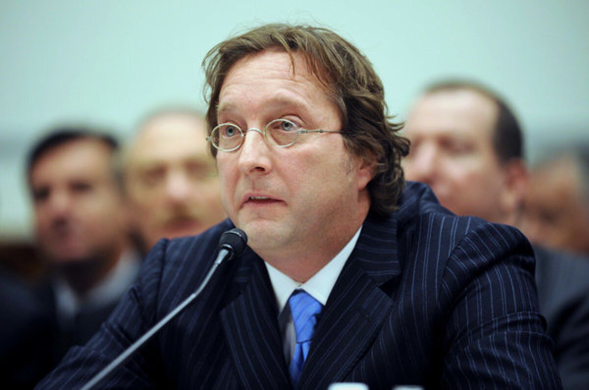 Philip Falcone of Harbinger Capital Partners testifies on Capitol Hill in Washington in 2008.