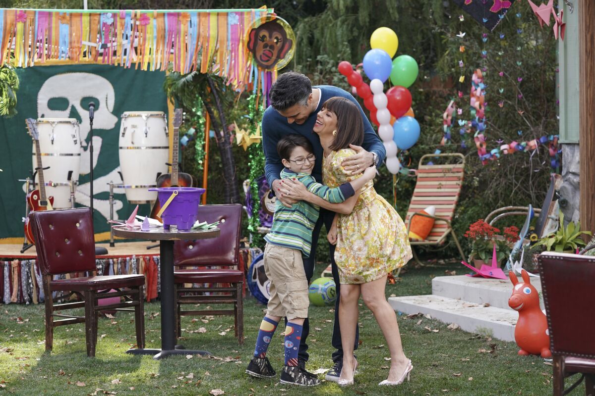 Antonio Raul Corbo, left, Jaime Camil and Natasha Leggero in "Broke" on CBS.