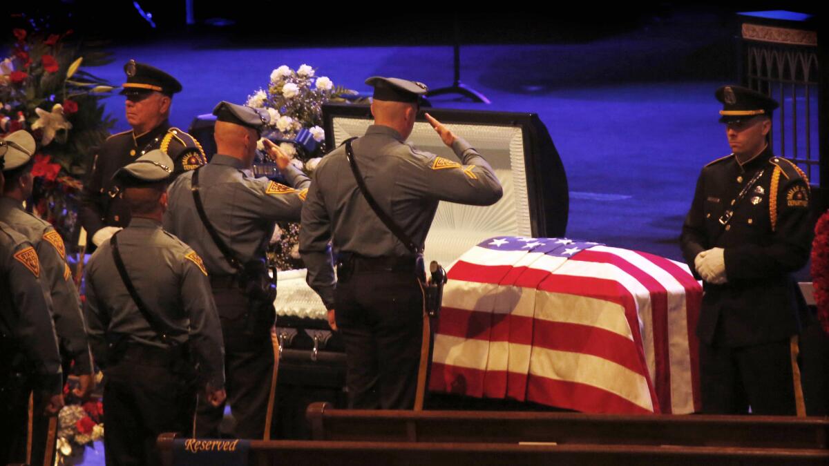 Funeral services are held for Dallas Police Sr. Cpl. Lorne Ahrens at Prestonwood Baptist Church in Plano, Texas.