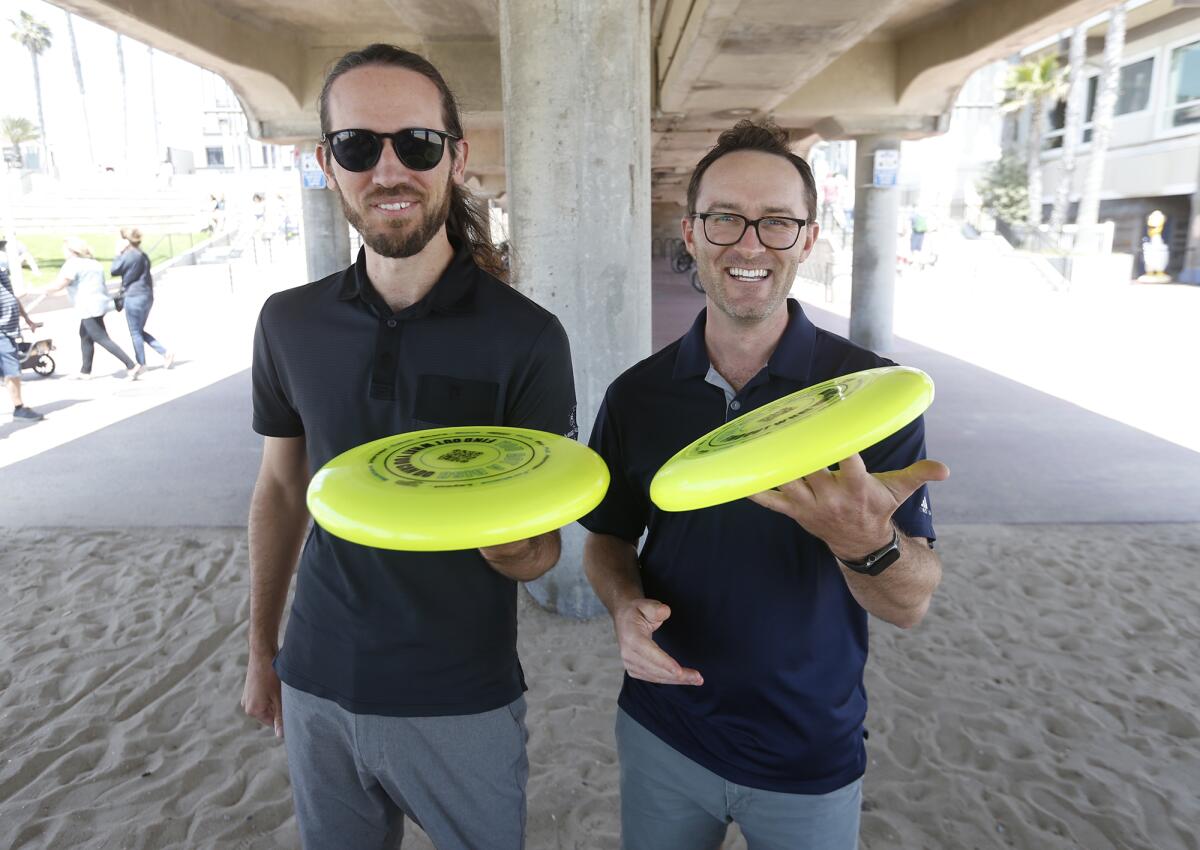 Jacob Walsh, left, president of OC Ultimate, and tournament director Grant Boyd.