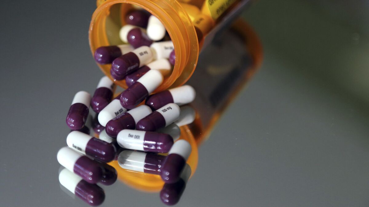 About 20 generic-drug manufacturers are accused in a federal lawsuit of conspiring with competitors to divide market share and coordinate price hikes.