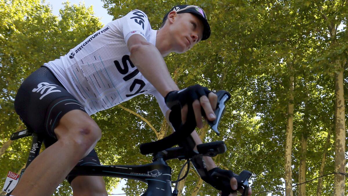 Chris Froome arrives for the start of Stage 14 of the Tour de France on Saturday in Blagnac, France.