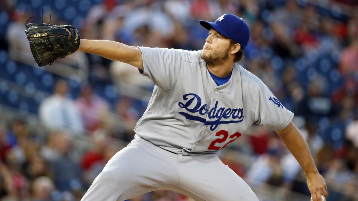 Dodgers starter Clayton Kershaw delivers a pitch during the team's 8-3 win over the Washington Nationals on Tuesday. It was Kershaw's first game since pitching in the Dodgers' season opener in Australia.