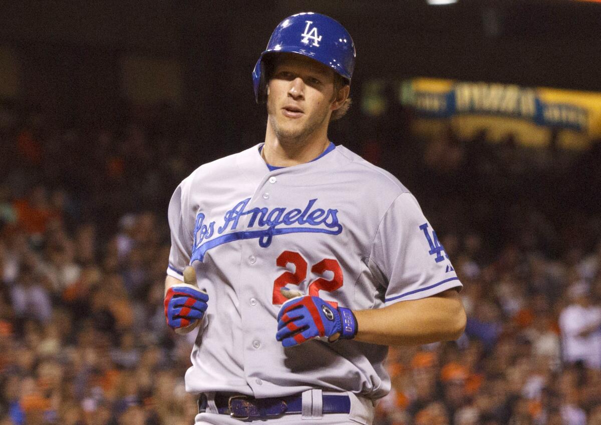 Dodgers' Clayton Kershaw scores a run against the San Francisco Giants earlier this season.