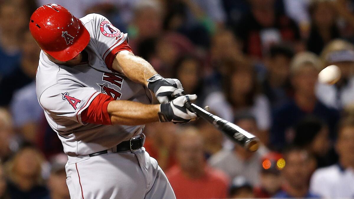 Angels catcher Chris Iannetta doubles in the go-ahead run in the ninth inning of the Angels' 4-3 win over the Boston Red Sox.