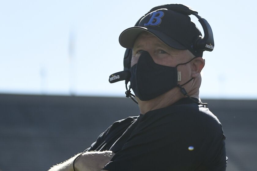 UCLA head coach Chip Kelly stands on the sidelines during the Bruins' game against California.