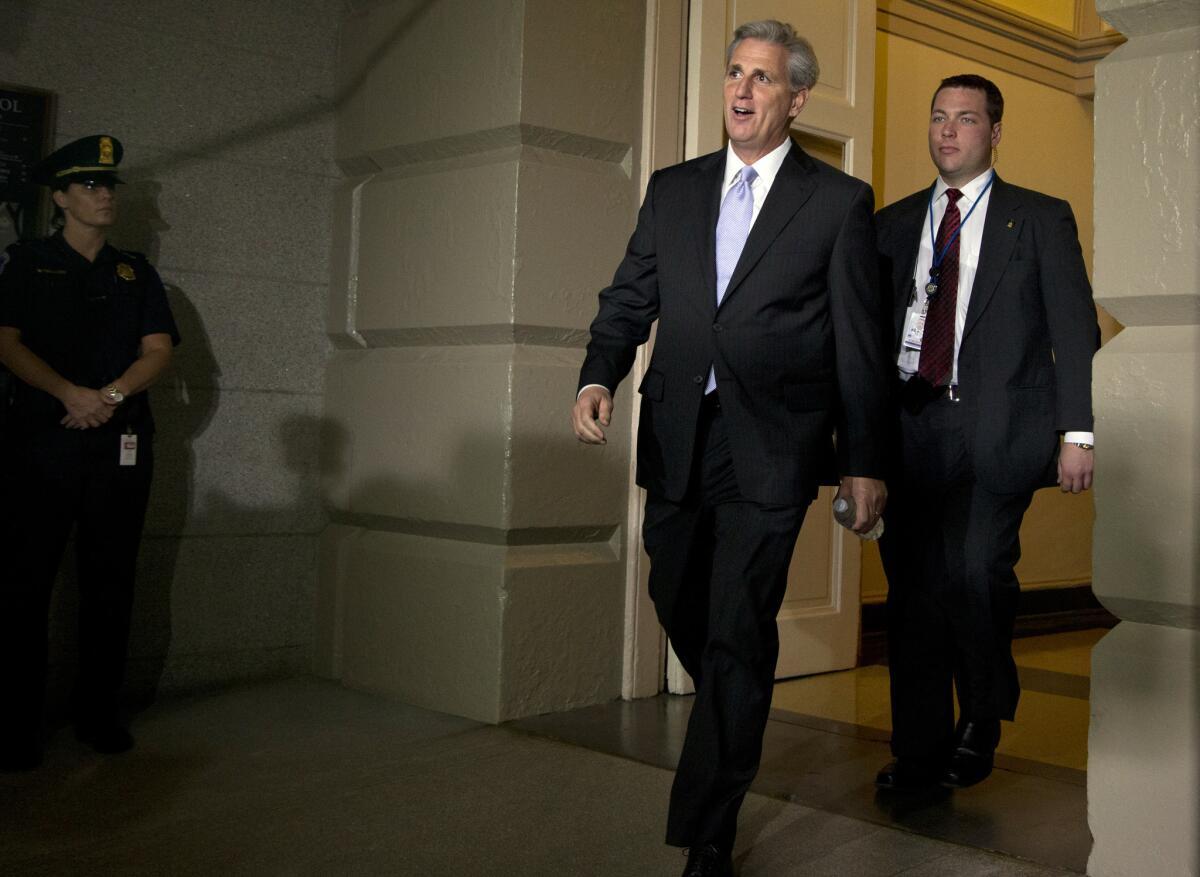 House Majority Whip Kevin McCarthy (R-Bakersfield) arrives for a meeting with House Republicans before Congress passed the budget bill and sent it to President Obama.