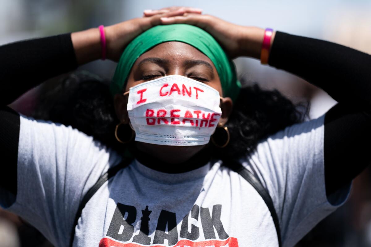 Protesters demonstrate at Pan Pacific Park after the death of George Floyd