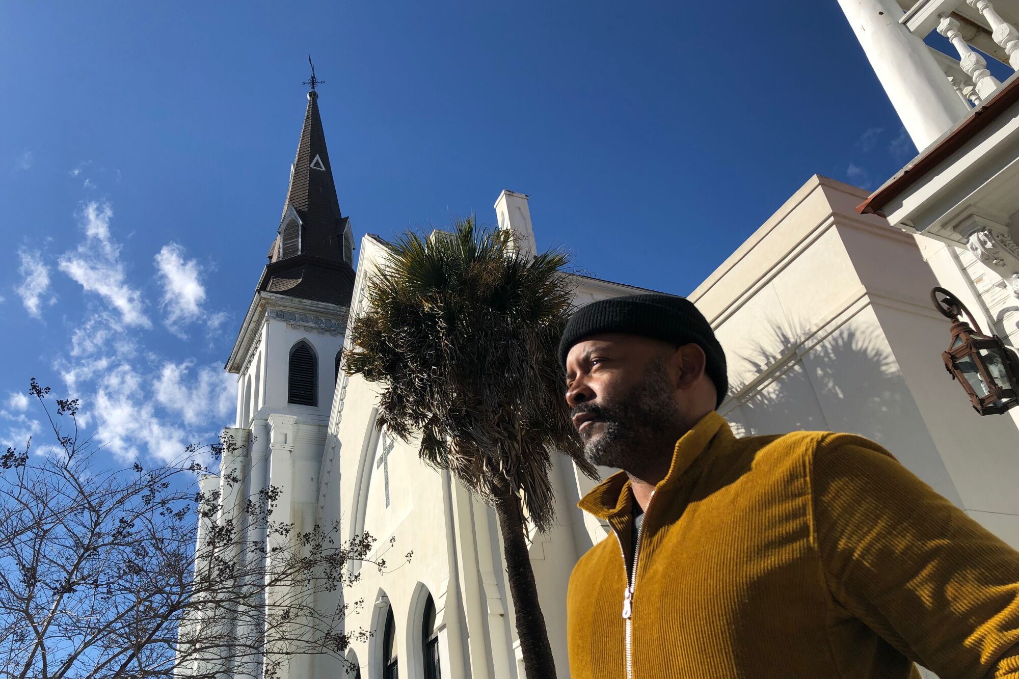 Reporter Tyrone Beason stands outside Mother Emanuel AME Church in Charleston.