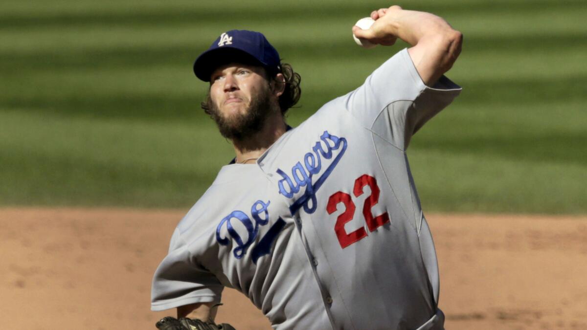 Dodgers starter Clayton Kershaw delivers a pitch during a game against the Chicago Cubs on Sept. 19, 2014.