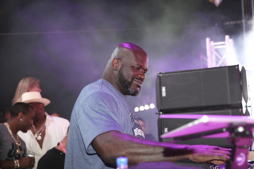 Shaquille O'Neal has been moonlighting as an electronic dance music DJ. Here DJ Diesel spins tracks July 8 in Cleveland.