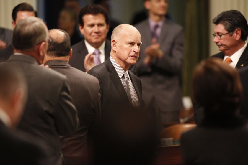 Gov. Jerry Brown receives applause at his State of the State address before a joint session of the California Legislature on Jan. 21, 2016, in Sacramento.