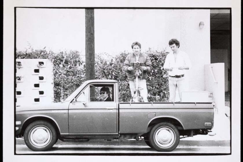 Danny Kwan, Ed Ruscha and Bryan Heath in Ruscha's Datsun pickup truck in 1975. From Ruscha's "Streets of Los Angeles" Archive.