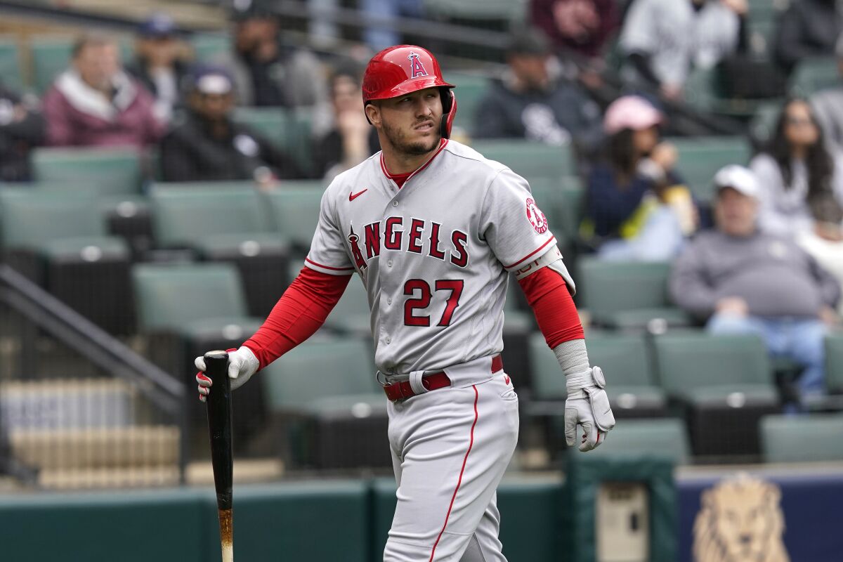 Los Angeles Angels' Mike Trout walks back to the dugout after striking out against Chicago White Sox.