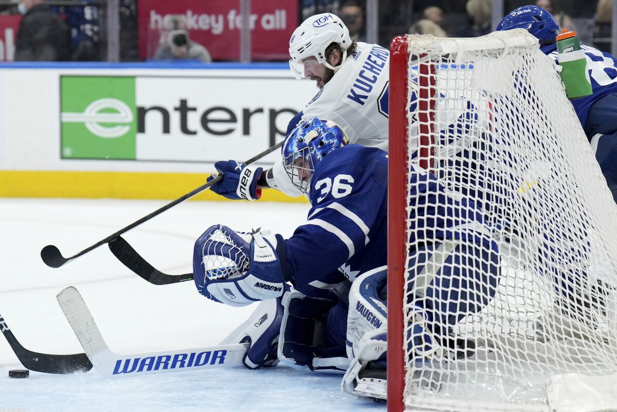 Tampa Bay Lightning forward Nikita Kucherov (86) is stopped by Toronto Maple Leafs goaltender Jack Campbell (36) during the third period of Game 1 of an NHL hockey Stanley Cup first-round playoff series in Toronto, Monday, May 2, 2022. (Nathan Denette/The Canadian Press via AP)