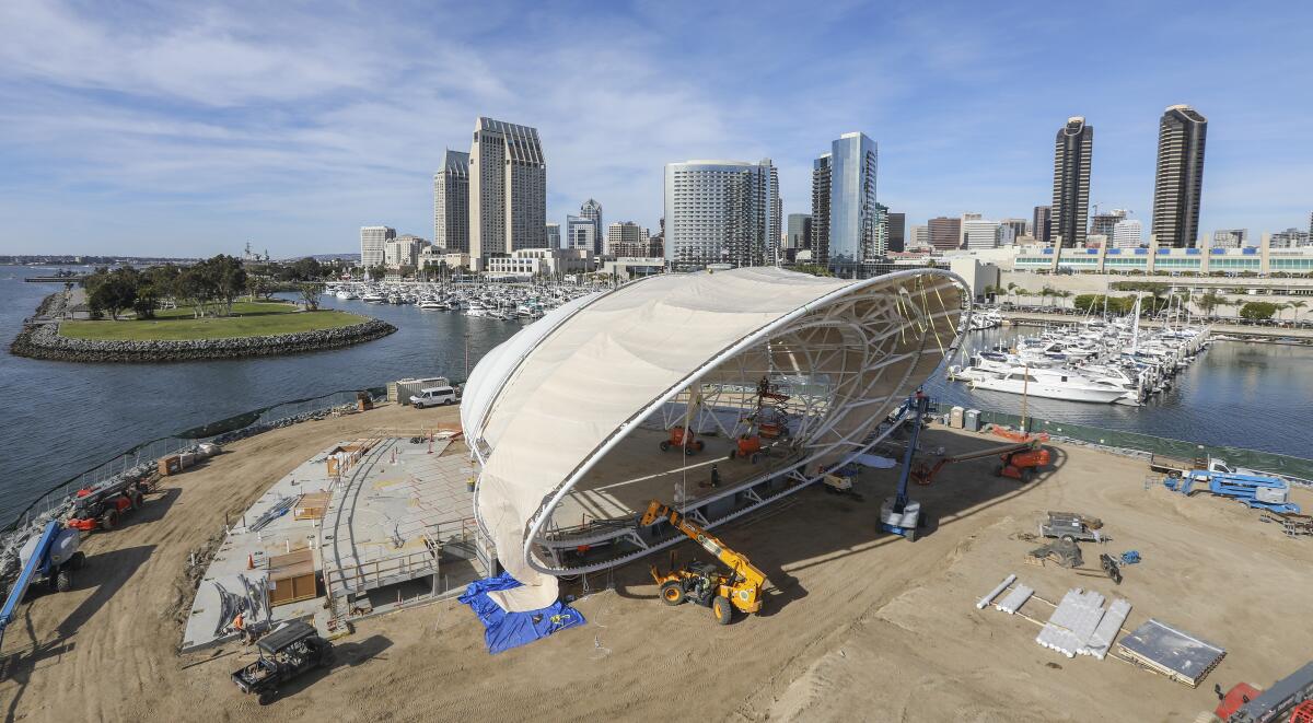 Construction crews work on the San Diego Symphony's new year-round outdoor concert venue, The Shell, at Embarcadero Marina Park South, adjacent to the San Diego Convention Center.