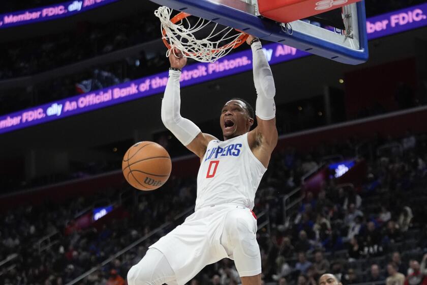 Los Angeles Clippers guard Russell Westbrook (0) dunks against the Detroit Pistons.