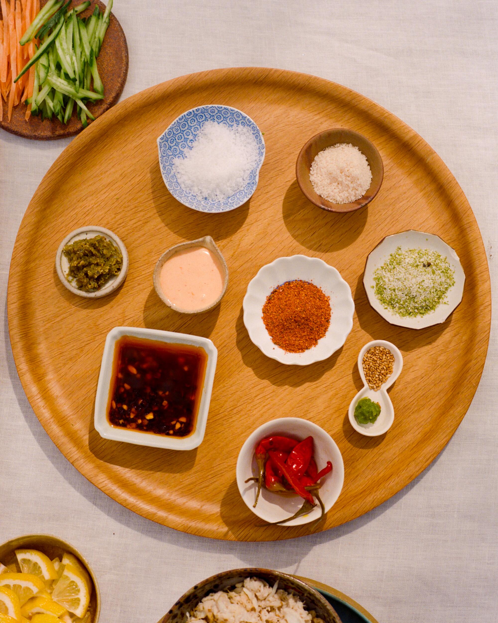 A plate of condiments for a hand roll party at home