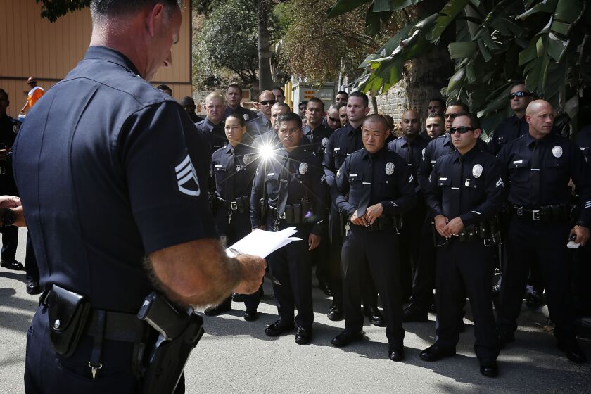 Sgt. Al Reyes speaks to a new platoon of LAPD Metropolitan Division officers who were deployed as part of the department's effort to drive down the crime increase last year.