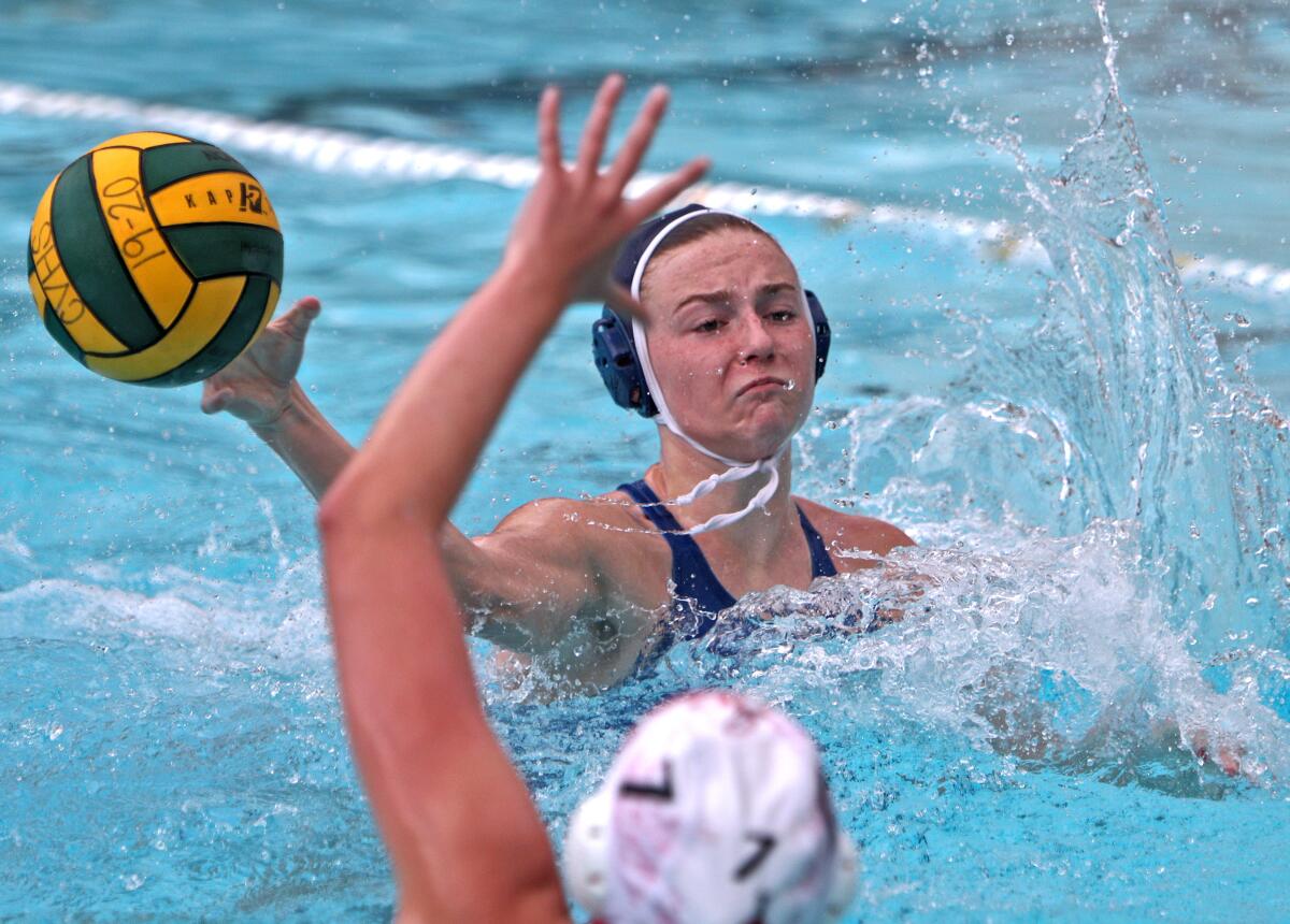 Crescenta Valley girls water polo player Katie Ward takes a shot on goal in game vs. Burbank Burroughs, at home in La Crescenta on Thursday, Jan. 16, 2020.