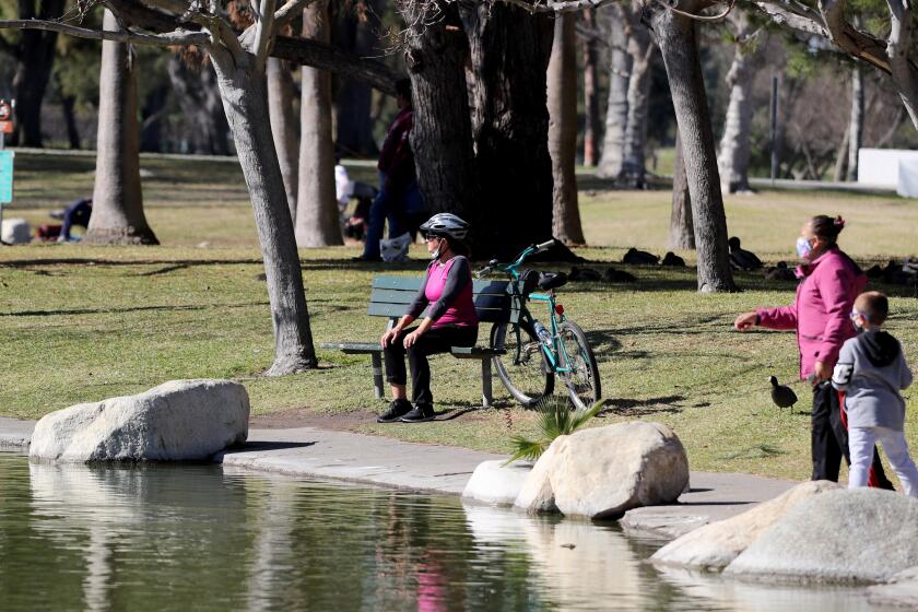 People enjoy a sunny day after a series or storms passed the area, at Mile Square Park in Fountain Valley on Saturday, Jan. 30, 2021.