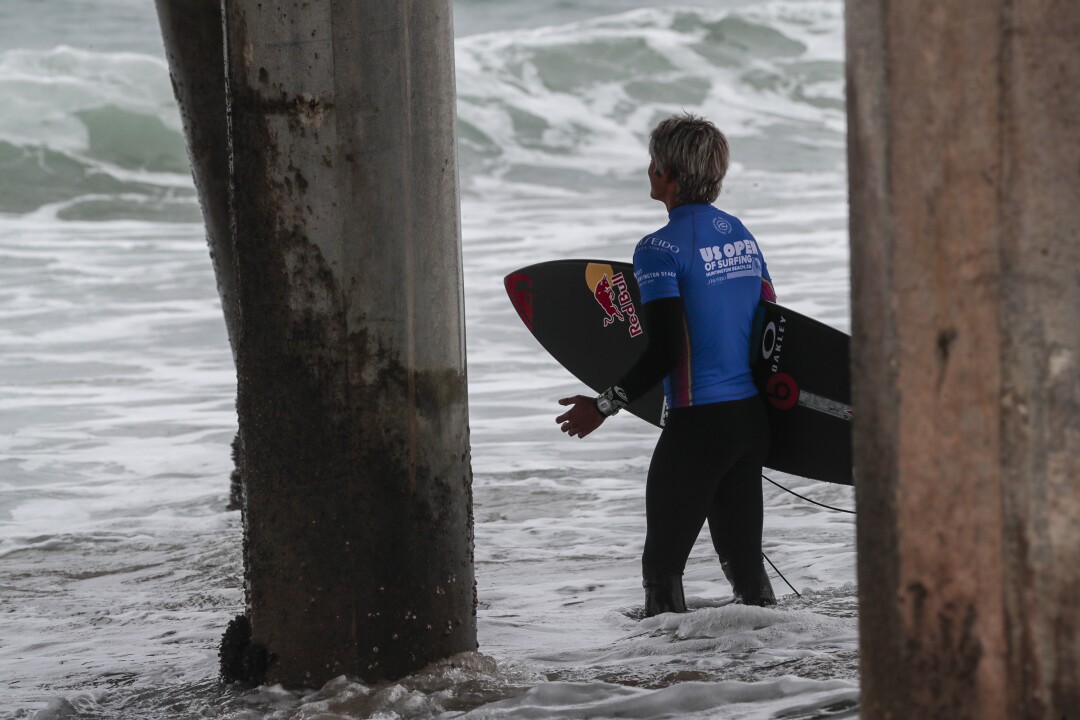 Kanoa Igarashi stops to meditate when he goes into the water to compete in the semifinals